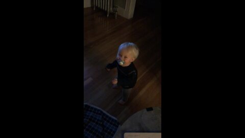 Toddler dances to Rocky Theme