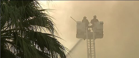 UPDATE: Part of roof, walls collapse in Las Vegas office building fire