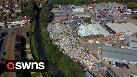 UK residents fuming after 32ft mountain of rubbish grows so tall it can be seen on GOOGLE EARTH