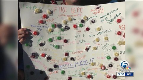 Kids thank firefighters as an act of kindness