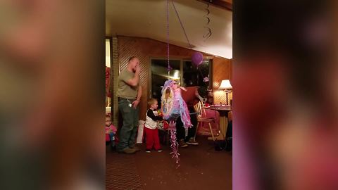 "Piñata FAIL: Boy Hits Man in Stomach"