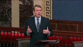 Sen. Michael Bennet speaks before impeachment vote