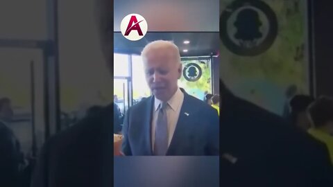 Biden is eating ice cream bragging about the economy.