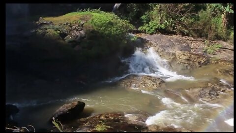 Amazing Rainbow Over Waterfall