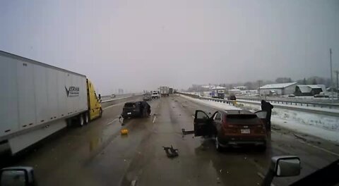 VIDEO: Semi carrying pellets slides, rollovers on I-41/94