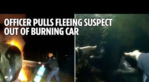 Officers pull fleeing suspect out of burning car