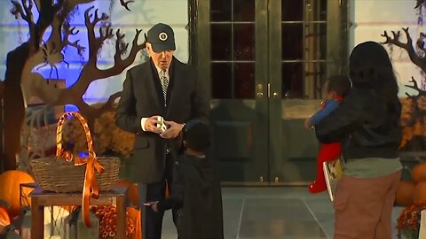 Joe Biden Drops The Candy After Being Startled By A Child's Halloween Costume