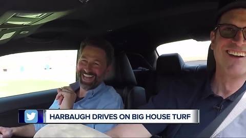 Jim Harbaugh does donuts on Big House turf