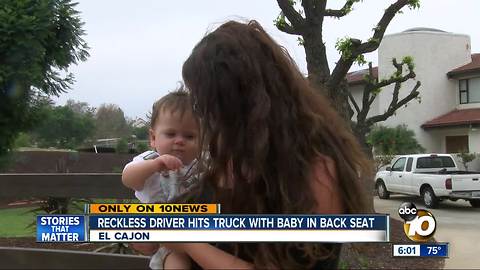 Reckless driver hits truck with baby in back seat