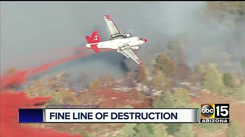 Woman's cabin survives flames from Goodwin Fire