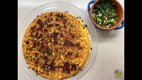 Tah Cheen - A tasty combination of rice and saffron with chicken & eggplant.