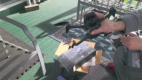 unboxing the HolyStone HS720G drone.