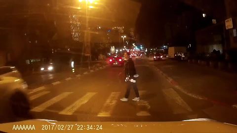 Driver receives instant karma after nearly hitting pedestrian