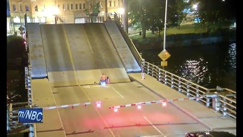 VIDEO: Woman hurt riding bike into bridge gap