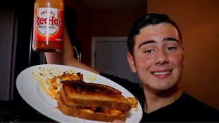 Making a buffalo Chicken Sandwich