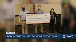 Rotary Club donates to Midwest Food Bank