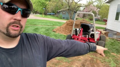 Ventrac 4500Y diesel Using the power bucket to back fill two egress windows.