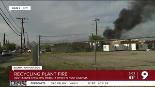 Fire at recycling plant fills skies with smoke