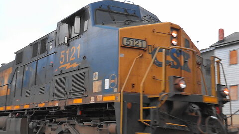 A MARC Passenger and Fast CSX Coal Train in Boyds Station