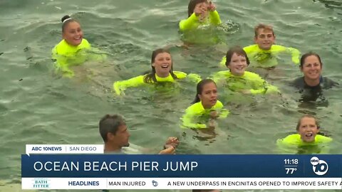 Junior Lifeguards jump off Ocean Beach Pier