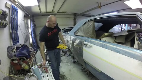 Dent pulling the passenger quarter panel of my 1967 Dodge Dart