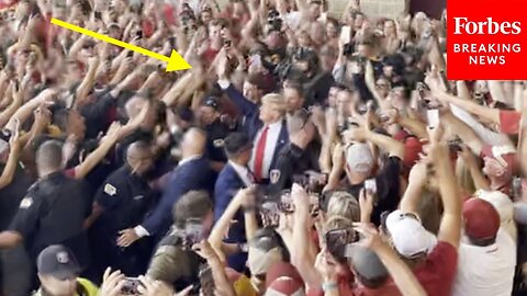 Crowd Chants, 'USA! USA!' As Trump Departs Iowa Football Game