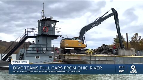 Dive team pulls dozens of cars from Ohio River