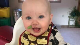 Baby learns to eat like a dog