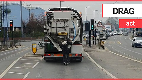 Jaw-dropping moment cyclist hitches a lift by hanging onto back of moving truck