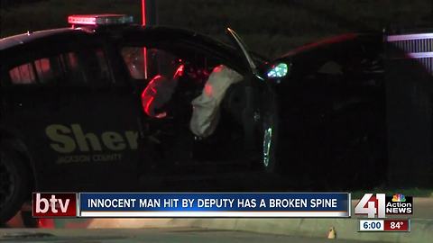 Bystander hit by deputy has broken spine