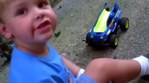 The remote control car in the alley. My youngest son at three. He's a man now. They grow up fast.