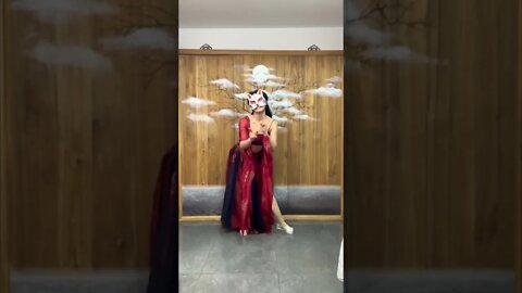 Beautiful Masked Chinese Girl Gets Ready For Christmas