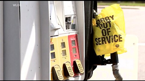 Officials warn against 'panic buying' at the pump