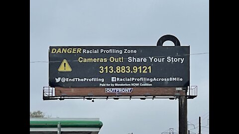 New billboard along 8 Mile Road alleges racial profiling in the area