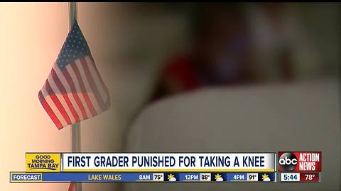 First grader told to stand after taking a knee during Pledge of Allegiance