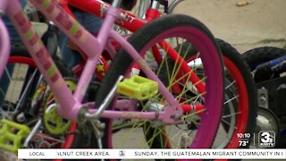 Omaha firefighters give away bikes and helmets