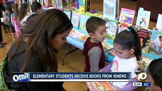 Elementary students receive books from 10News