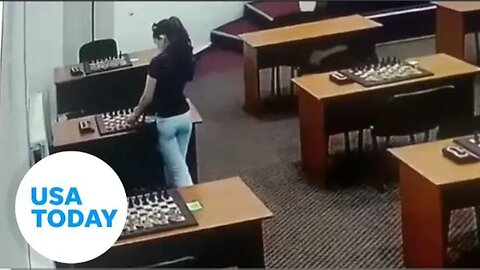 Shocking surveillance_ Chess champion allegedly tries to poison rival _ USA TODA