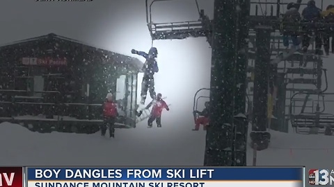 Crews rush to save little boy dangling from ski lift