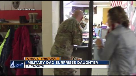 Military dad surprises daughter at school