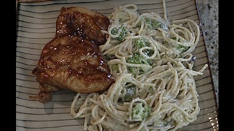 BBQ chicken thigh and Alfredo pasta w/ sautéed vegetables