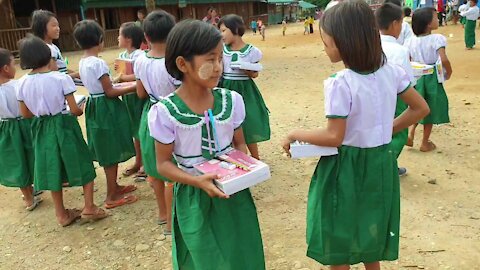 Distributing School Supplies and Uniforms to Refugee Kids