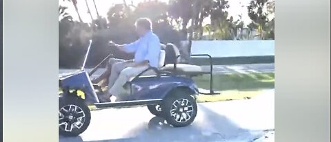 Tucker Gleefully Drives Golf Cart With Wife, Not a Worry in the World