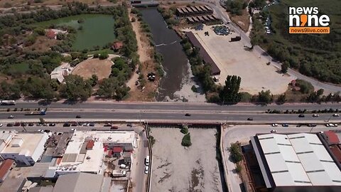 DRONE FOOTAGE REVEALS STREAM IN VOLOS, GREECE COVERED WITH DEAD FISH AMID CLEAN-UP EFFORTS