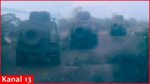 Footage of Ukrainian soldiers advancing with equipment and breaking through defense line in Kursk