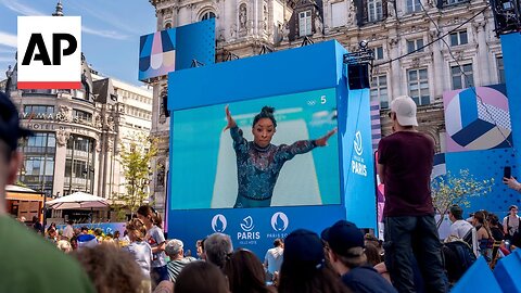 Olympics fans battle the heat outside venues across Paris