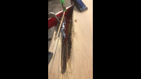 Epoxy leak during a Wood Slab Repair