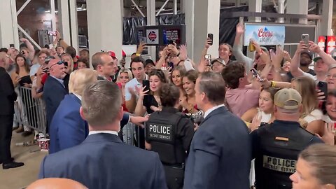 Trump arrives at the stadium in Tuscaloosa for the Alabama vs. Georgia football game