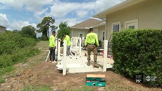 Nonprofit, construction company join forces to give veteran new patio