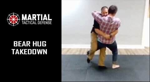 Bear hug trip takedown pin